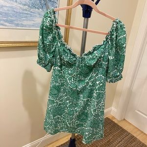 Cute green and white floral dress with our sleeves
